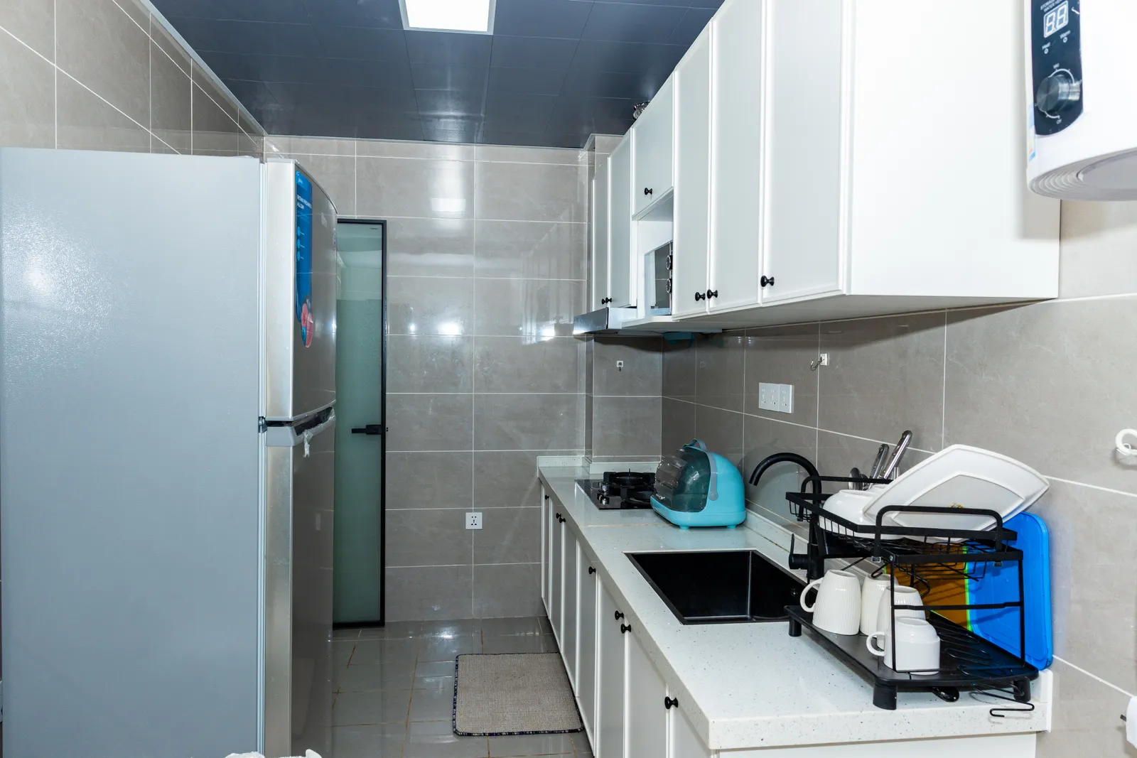 Kitchen — Furnished apartment in Kipé, Conakry