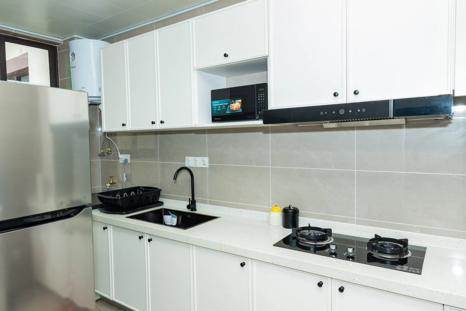 Kitchen — Furnished apartment in Kipé, Conakry