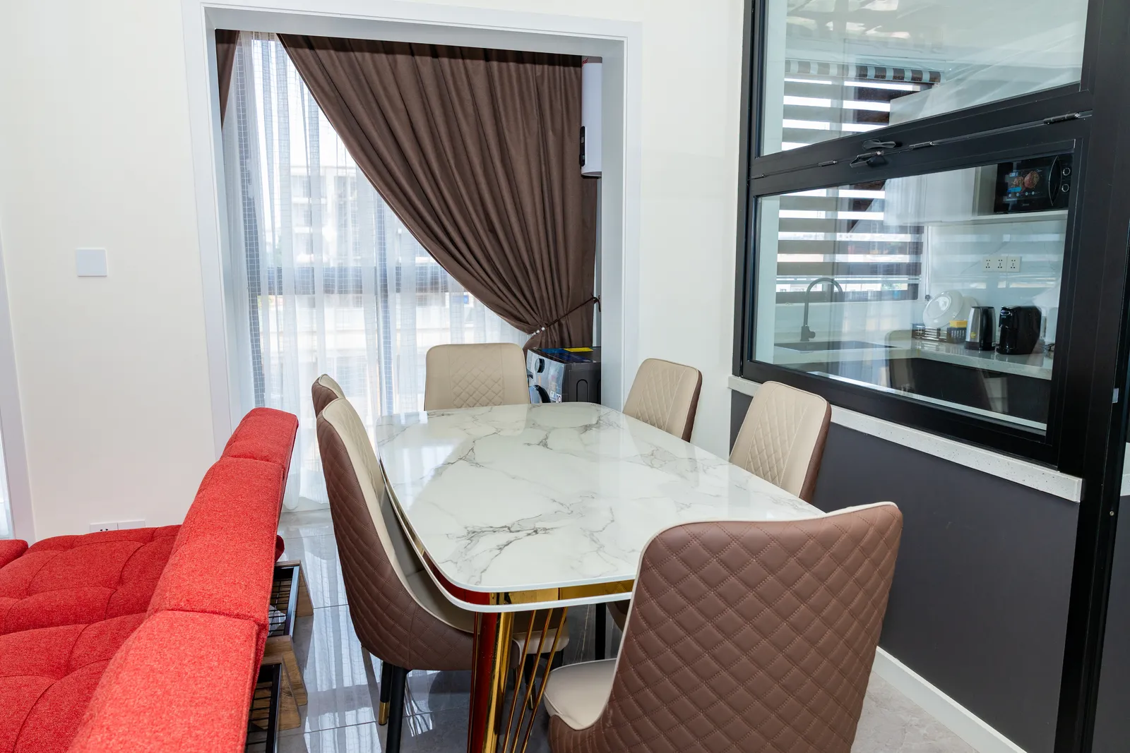 Dining area — Furnished apartment in Kipé, Conakry