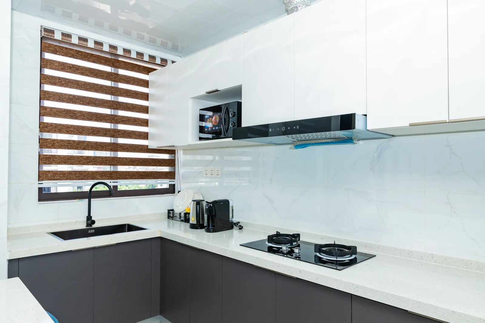 Kitchen — Furnished apartment in Kipé, Conakry